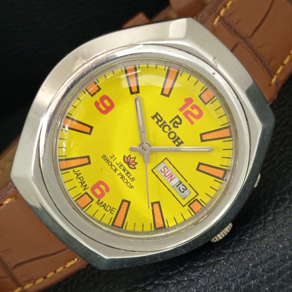 

RICOH R31 AUTOMATIC VINTAGE JAPAN MENS YELLOW COLOR DIAL WATCH a707706-1