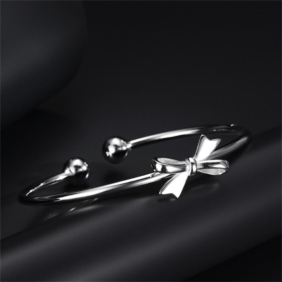 

Металлические открытые браслеты-манжеты с бантом для женщин и девочек, простые преувеличенные геометрические браслеты, рождественский подарок серебряный