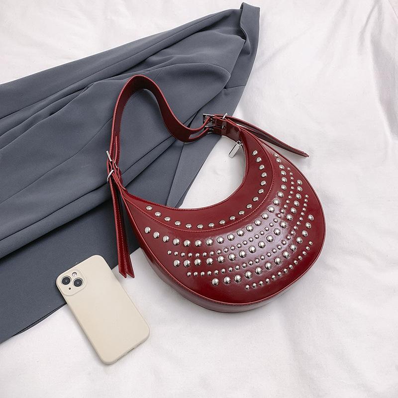 Women's bag 2025 new European and American fashion rivet punk style shoulder bag, large capacity shoulder hand, armpit bag