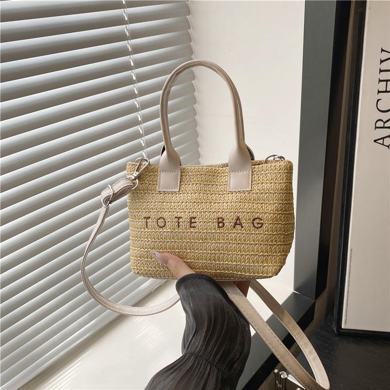 Sommer beliebte Strohhandtasche Damen neue Mode Buchstaben gewebte Tragetasche Strandurlaub Strandtasche