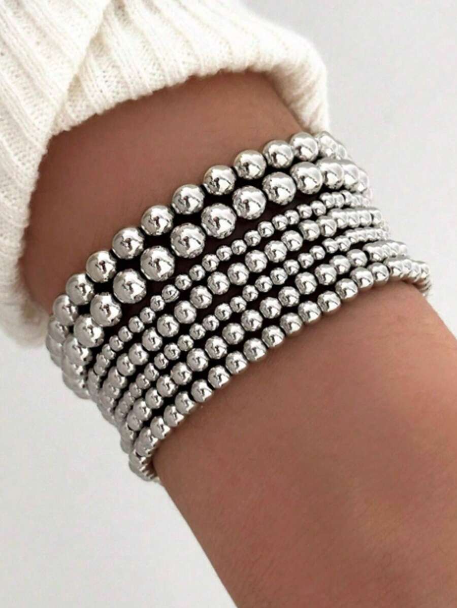 

Набор из 7 простых браслетов из бусин для женщин, нейтральные повседневные аксессуары для отпуска, свидания, на каждый день 7PC серебряный