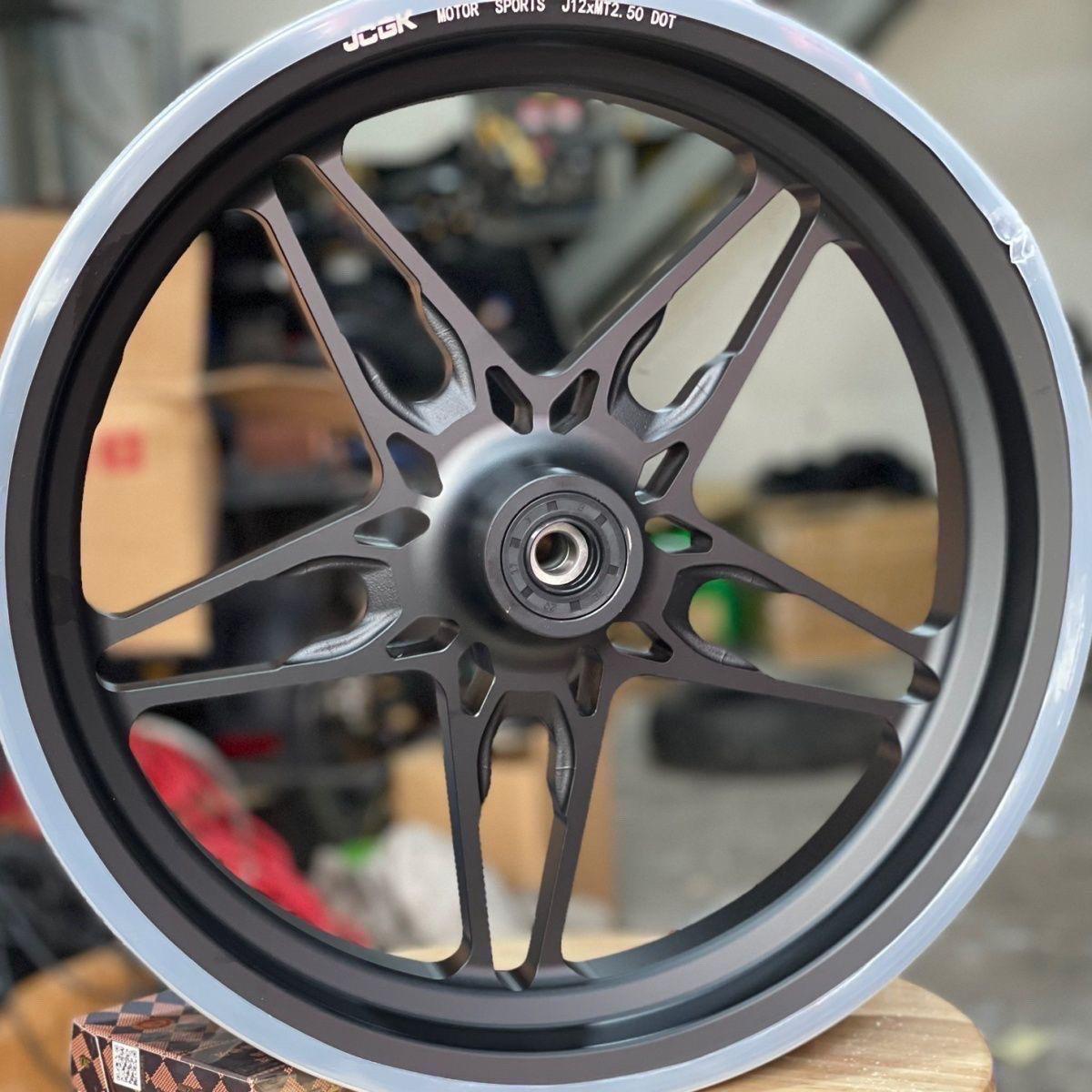

JCGK 12-inch 5-star front disc brake rims J12*2.5 for Niu N1S/U+B, Ninebot E200 modifications.