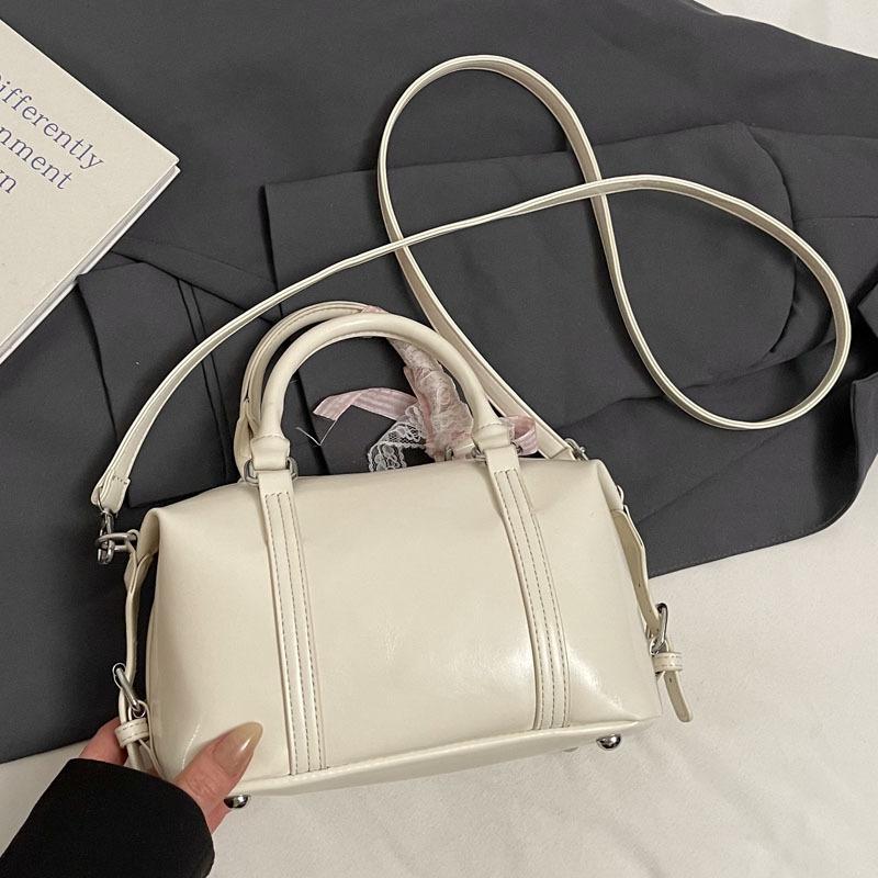 Fashion niche hand carry bowling bag women 2025 new Korean version trend high-end shoulder bag versatile messenger bag
