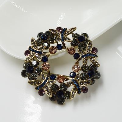 Spilla con strass colorati a forma di corona di temperamento squisito, spilla intarsiata cava