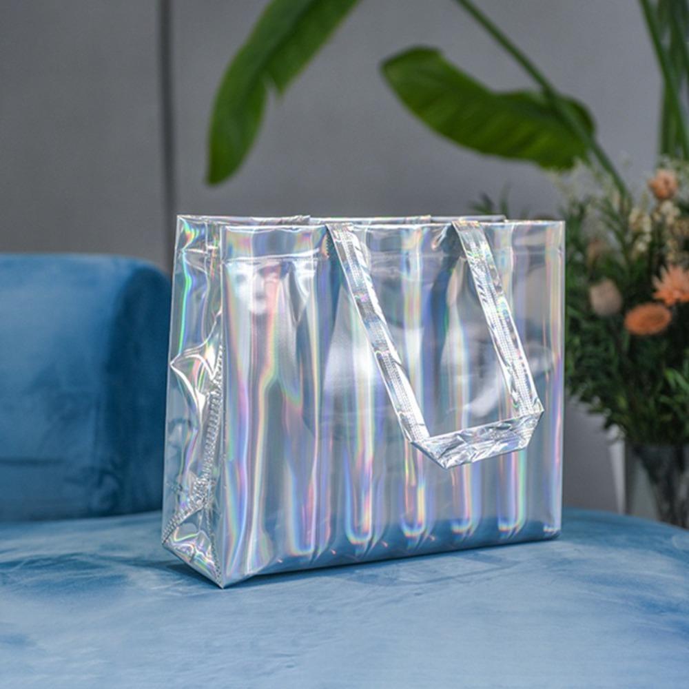 Neue Handheld-Geschenkverpackungstasche Wasserdichte Handtasche mit großem Fassungsvermögen PVC-Laser-Tote Bekleidungsgeschäft