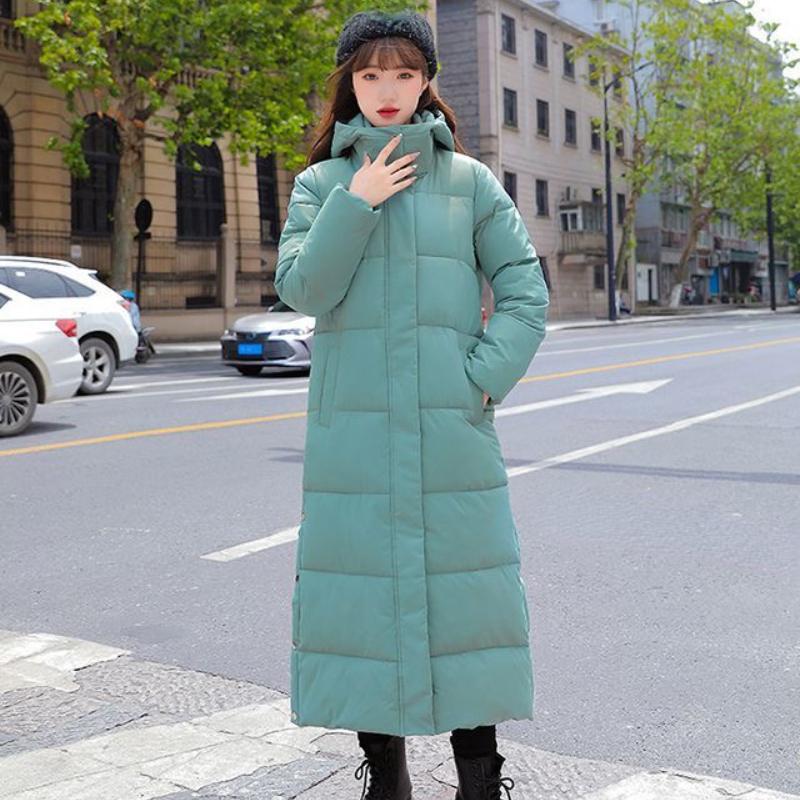 Зимние длинные парки с капюшоном — фото 8