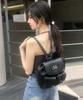 Aren Two-Pocket Leather Mini Backpack Unisex