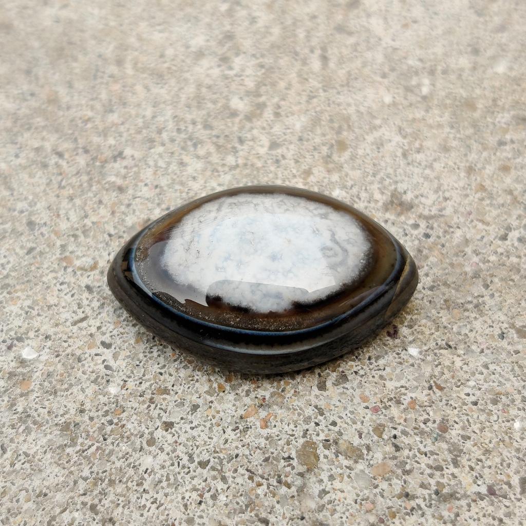 22.35 Carat, Black Banded Eye Agate Cabochon Gemstone, 24x16x8 MM Size.