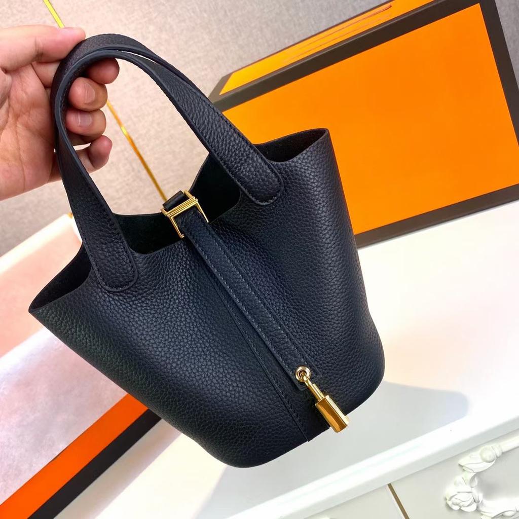 Hochwertige halbhandgefertigte Gemüsekorbtasche togo erste Schicht Rindsleder Pendlertasche echtes Leder tragbare Beuteltasche Damen 18cm