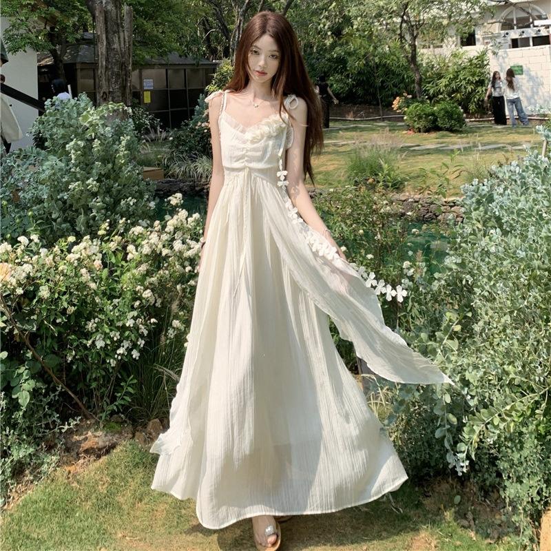 Holiday style design suspender dress for women's 2026 summer new waist and thin temperament long skirt