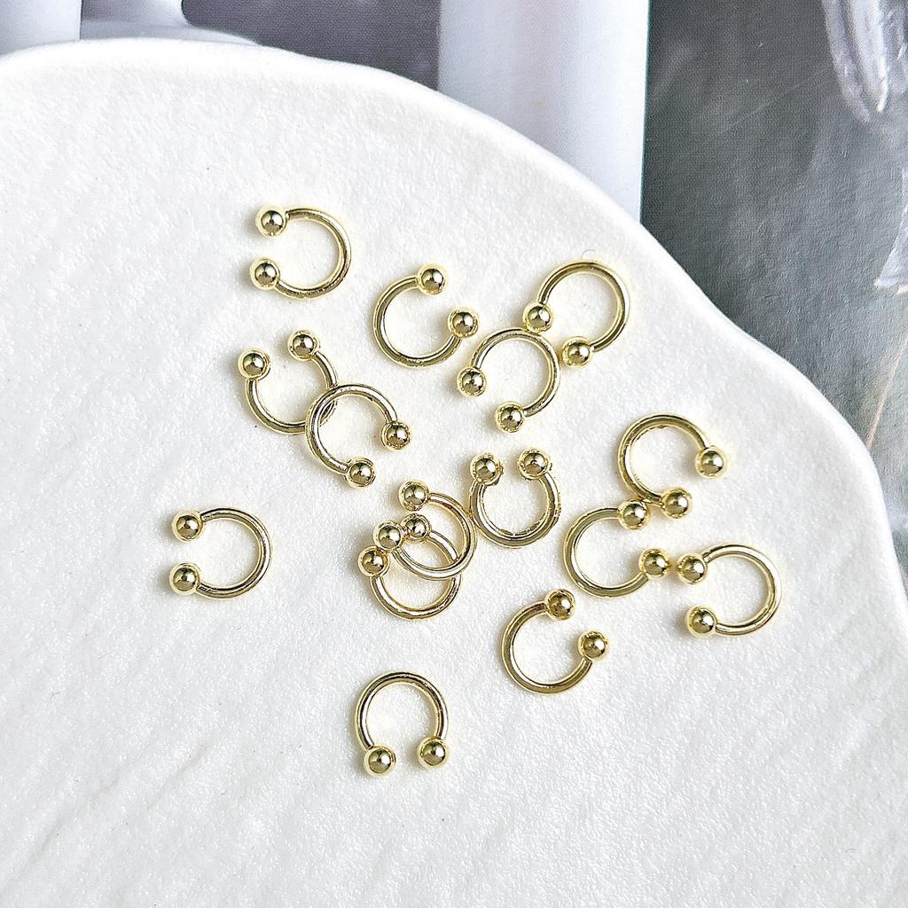 Legierung Gebogener Stab Augenbrauenstecker Außengewinde Doppelseitig Vergoldet Spitzkegel Punk Style Nagelkunst Zubehör DIY Nagel Süß Cool Dekoration DIY