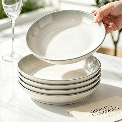 Frieden & Liebe Keramik-Geschirrset: Elegante runde Teller und Schalen aus Jingdezhen