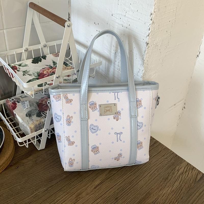 Eimertasche mit großer Kapazität Damen neue Handtasche mit Cartoon-Print High-End Pendler Schultertasche zum Umhängen