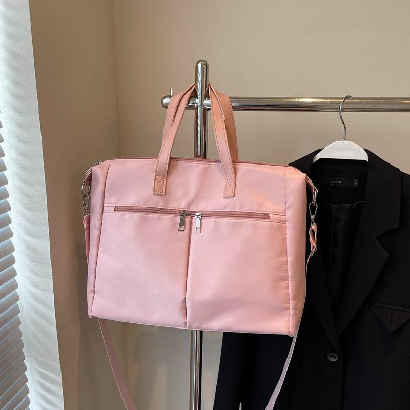 Korean version of simple canvas fashionable large-capacity women's bag 2025 autumn casual foreign style commuter bag shoulder armpit bag