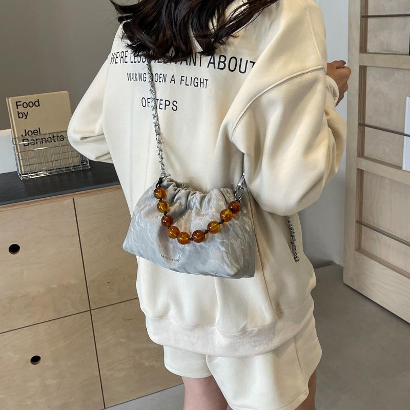 This Year, the Popular Small Bag Women's 2025 New Niche Light Luxury Pleated Cloud Bag Fashionable Pearl Chain Messenger Bag