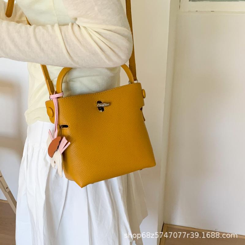 2025 Spring and Summer New Korean Bucket Bag Niche Casual One-shoulder Crossbody Hand-held Commuter High-end Women's Bag