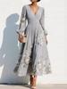 Frühling neue europäische und amerikanische Stil V-Ausschnitt bedrucktes Chiffon-Langarmkleid Damen Taille A-Linie Rock Urlaubsstil langes Kleid