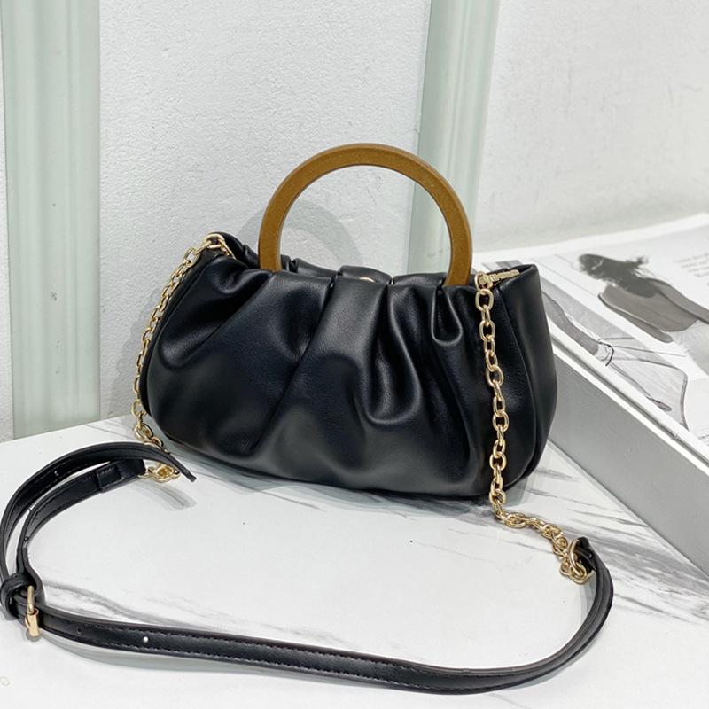 A Mini Crossbody Bag with A Unique Design Sense of Pleated Clouds