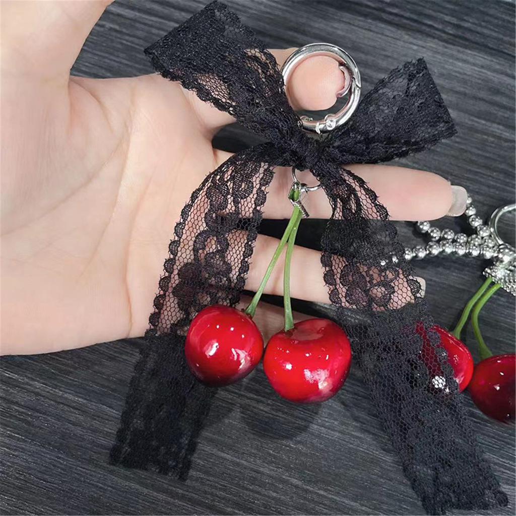 Cherry Pendant Keychain With Bowknot Fashionable Cherry Keychain with Pearlescent Bowknot Accents for Trendsetters
