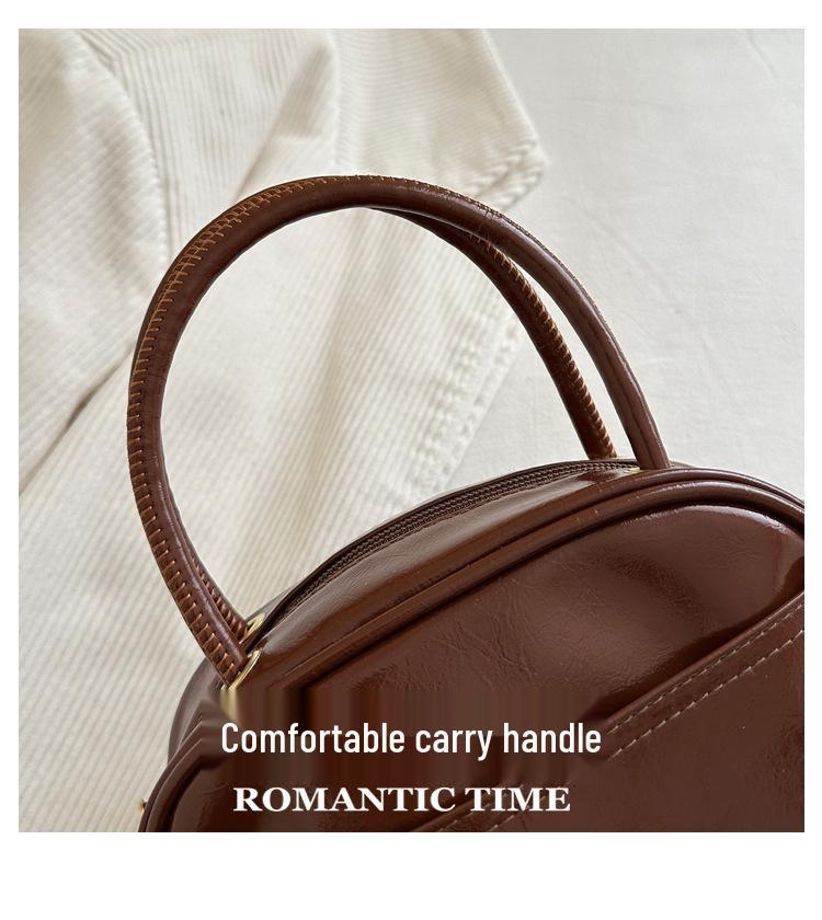 Retro-Texture Bowling Bag: Casual Commute & Niche Design with a Simple, Textured Pillow-Style Shoulder Bag