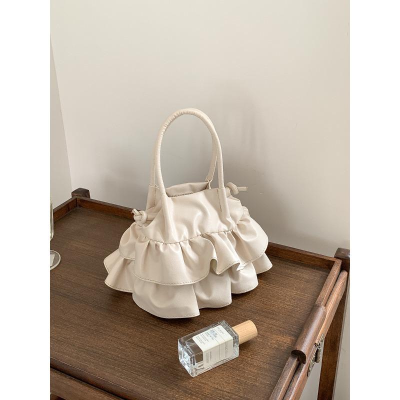 

Spring niche design lotus edge portable pleated bag soft messenger bag creative new shoulder bag women грязно-белый