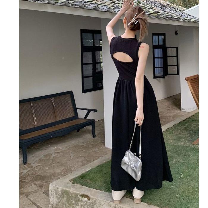 

Black round neck sleeveless French retro super fairy knee dress women s spring design sense hollow backless long skirt 2XL чорний