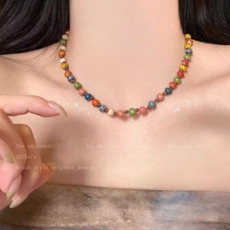 Color ceramic flower necklace women's new popular new Chinese sweater chain long beaded woven rope accessories