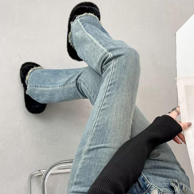 Autumn and winter new high-waisted rough-edged micro-flared jeans women's micro-pull slim-fitting retro trousers