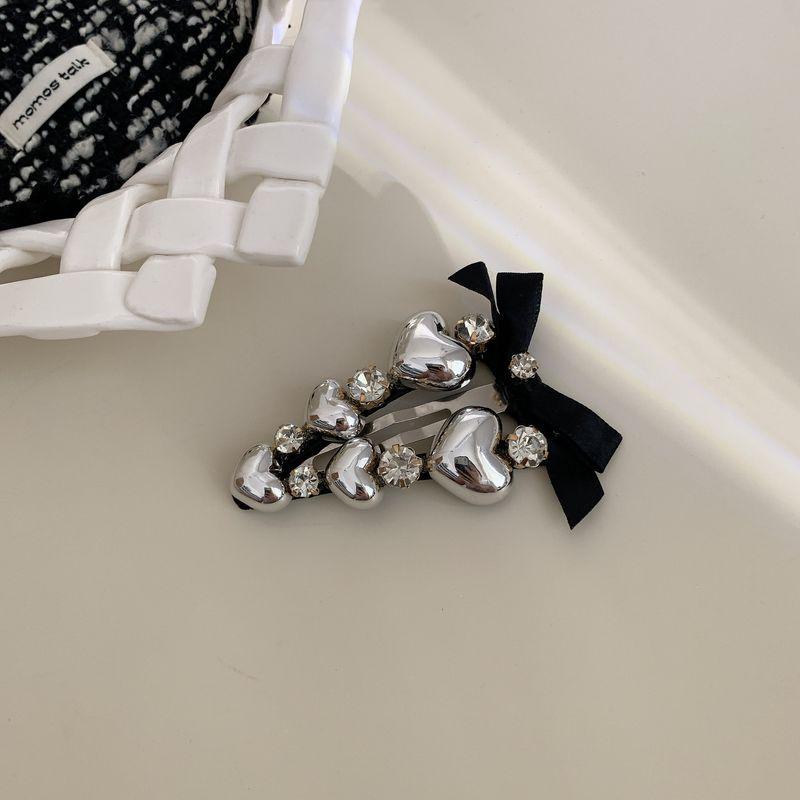 

1pc Stylish and stylish silver heavy industry heart-shaped temperament black bow hair clip BB clip hair clip new hair accessory