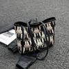 This year's popular bag women's 2025 new fashion niche shoulder canvas bag versatile large-capacity commuter tote bag