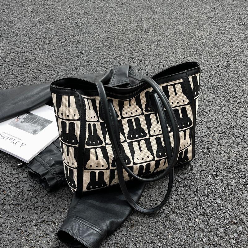 This year's popular bag women's 2025 new fashion niche shoulder canvas bag versatile large-capacity commuter tote bag