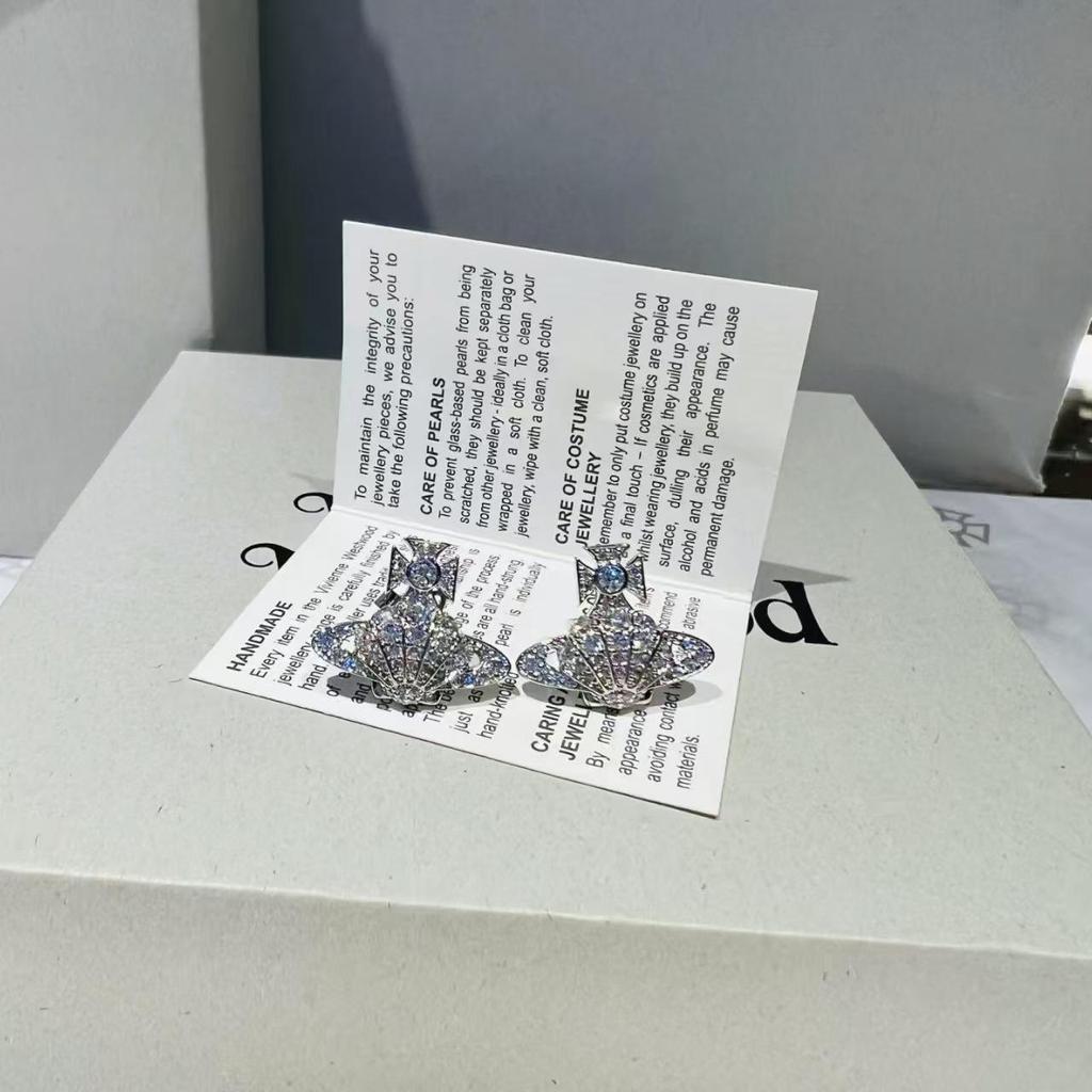 Vivienne Westwood Diamond Shell Saturn Jewelry Set: Necklace, Bracelet, and Earrings – Women's Luxury Versatile Collection.