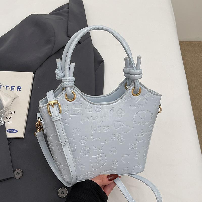 

Korean niche fashion cute embossed portable vegetable basket bag women s spring fashion versatile commuter messenger bag