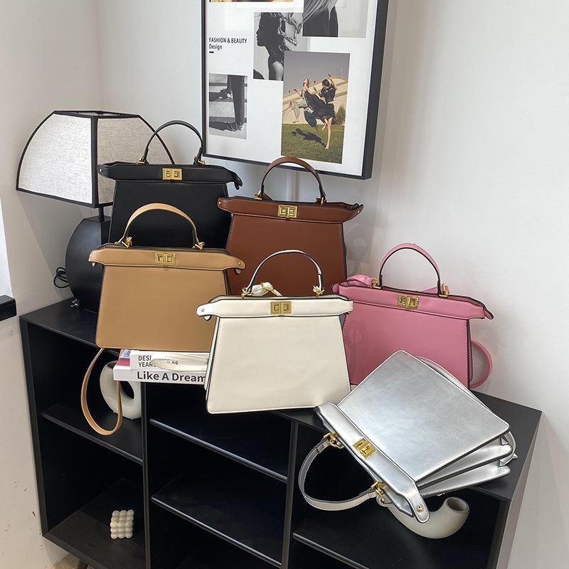 New High-end Solid Color Lock Kaibaoli Portable Shoulder Oblique Span Women's Bag