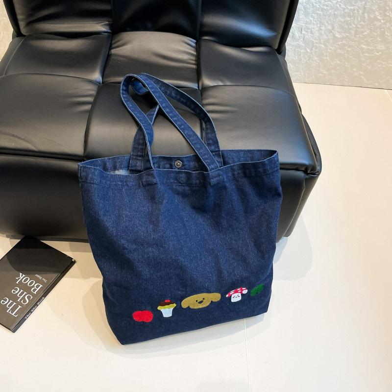 Casual canvas bag design sense niche women's bag 2025 new cartoon printed tote bag large capacity shoulder bag