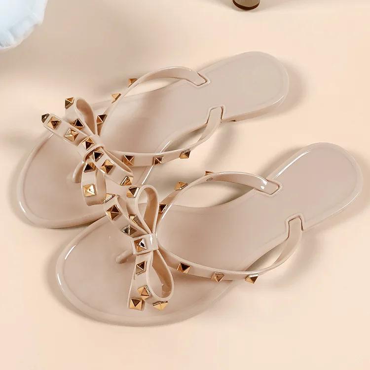 Fashion Woman's Sandals Flats Fashion Woman Flip Flops Summer Slippers Cool Beach Rivets Bowknots Flats Jelly Shoes PVC