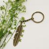 Elegant Feather Keychain Pendant - Hot Selling Simple Jewelry