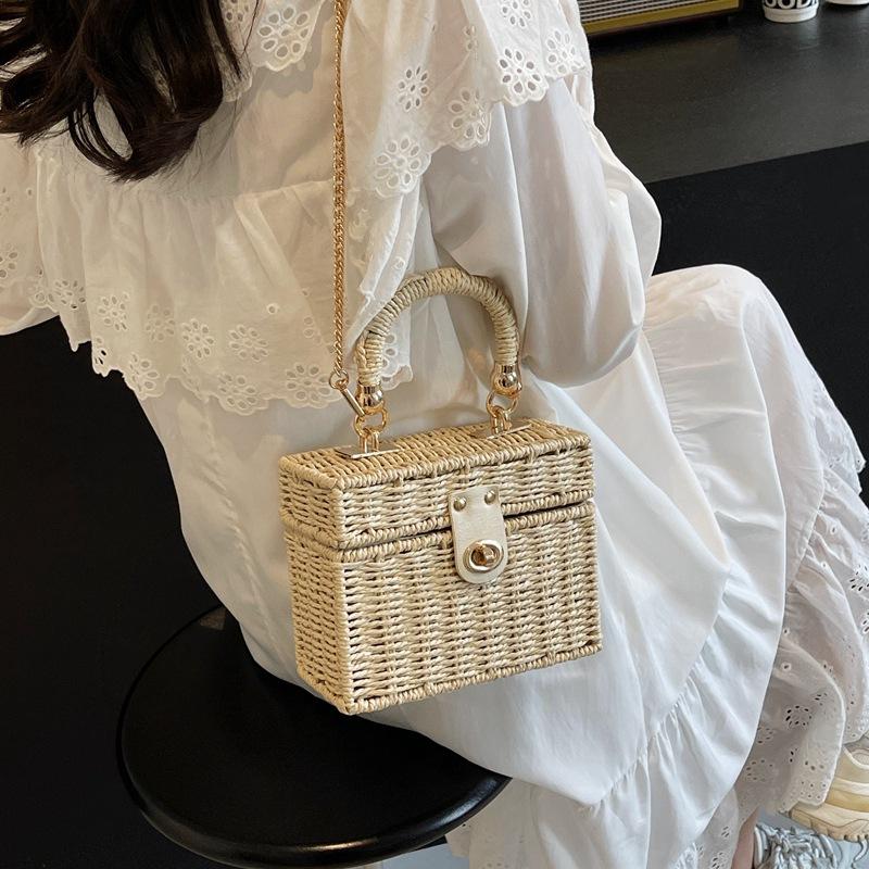 

New trendy woven lock briefcase shoulder portable diagonal span beach bag