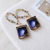 PU Leather Retro floral prints Cover with Glitter Bead Wrist Chain Strap Bracelet For Samsung Galaxy Z Flip 6 5 4 3 Phone Case