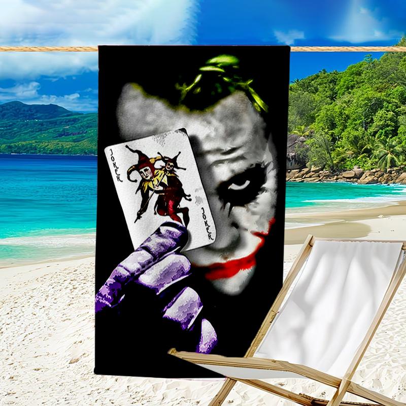 proof beach towel with a Joker character pattern - soft,absorbent,quick-drying,machine washable - perfect for swimming,camping,bathing