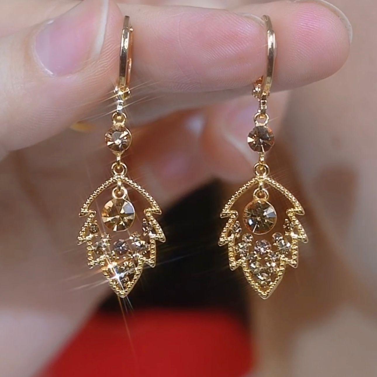 

New Maillard color full of diamond leaves fringed ear buckles, niche design sense fashionable personalized earrings earrings women