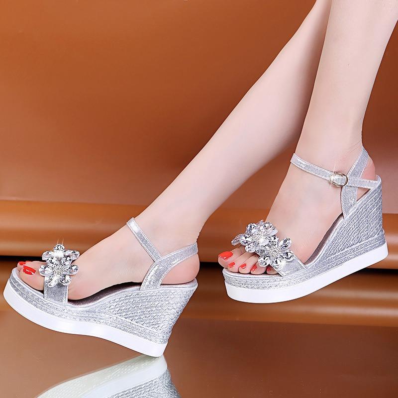 Spring and summer new muffin bottom slope heel rhinestone flower one-word buckle sandals