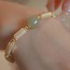 Elegant and gentle natural Hetian jade bracelet for women, vintage light luxury niche white butterfly shell bamboo knot bracelet jewelry