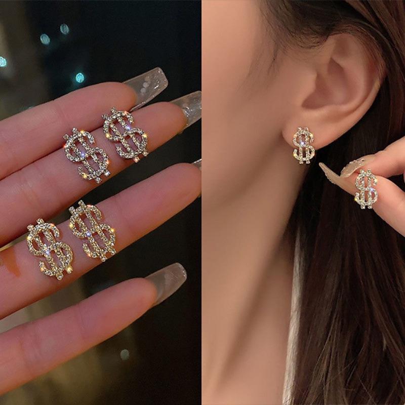 Exquisite Euro-Style Rhinestone Dollar Sign Stud Earrings – Versatile, Luxurious Jewelry for Women.