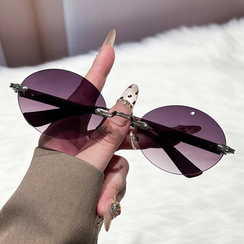 New oval frame sunglasses personalized borderless European and American trend sunglasses concave fashion sunglasses