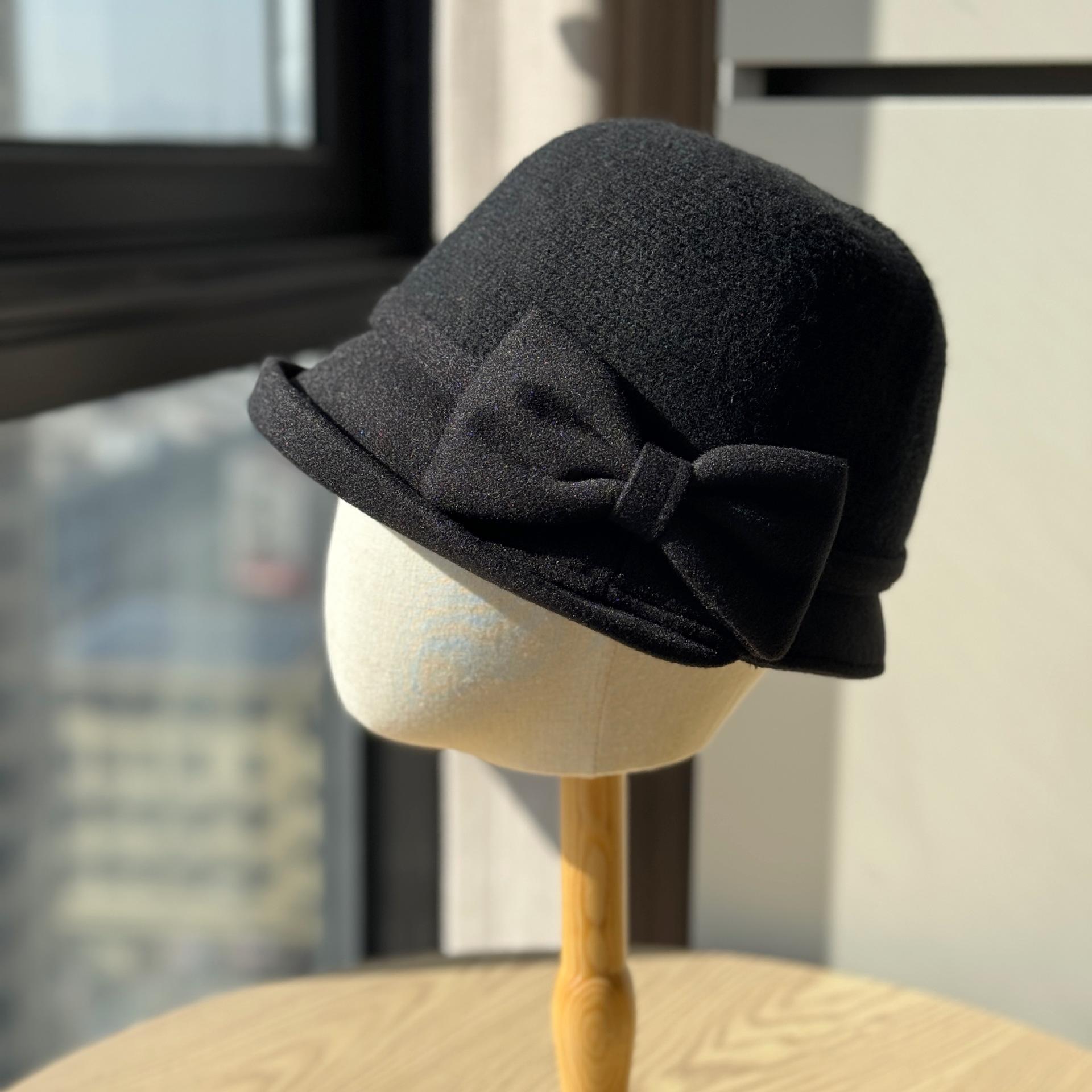 

New autumn and winter women s fisherman hat with rolled brim and bow, warm and stylish, Hepburn style, makes the face look smaller, suitable for Adult54-60Adjustable чёрный