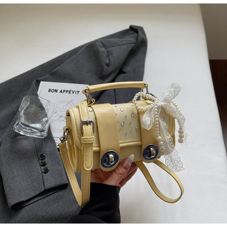 

Нишевая дизайнерская сумка сумка-цилиндр женская 2025 новая летняя сумка-мессенджер корейская версия модная повседневная портативная сумка-подушка