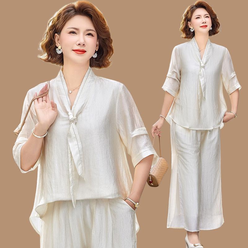 

Mom s Summer 2026 Stylish Outfit: Short Sleeve Top & Wide Leg Pants Two-Piece Set for Middle-Aged and Elderly Women. 2XL (approx. 105-120 jin) бежевий