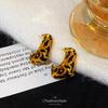 C-ring leopard print stud earrings, unique niche earrings, light luxury and high-end sense, painless mosquito coil disc ear clips, no ear piercings.