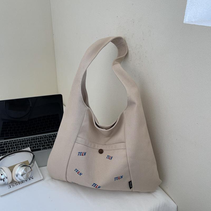 Canvas Bag Women's 2025 Autumn New Fashion Shoulder Bag Large Capacity Commuting Korean Niche Design Underarm Bag